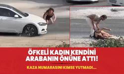 Öfkeli kadın kendini arabanın önüne attı! Kaza numarasını kimse yutmadı