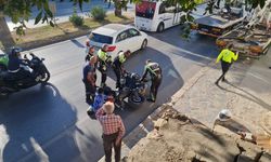 Bodrum'da sinirlenen kadın, polis motosikletine tekme atarak devirdi