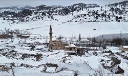 Baraj altında kalan köy 16 yıl sonra beyaza büründü